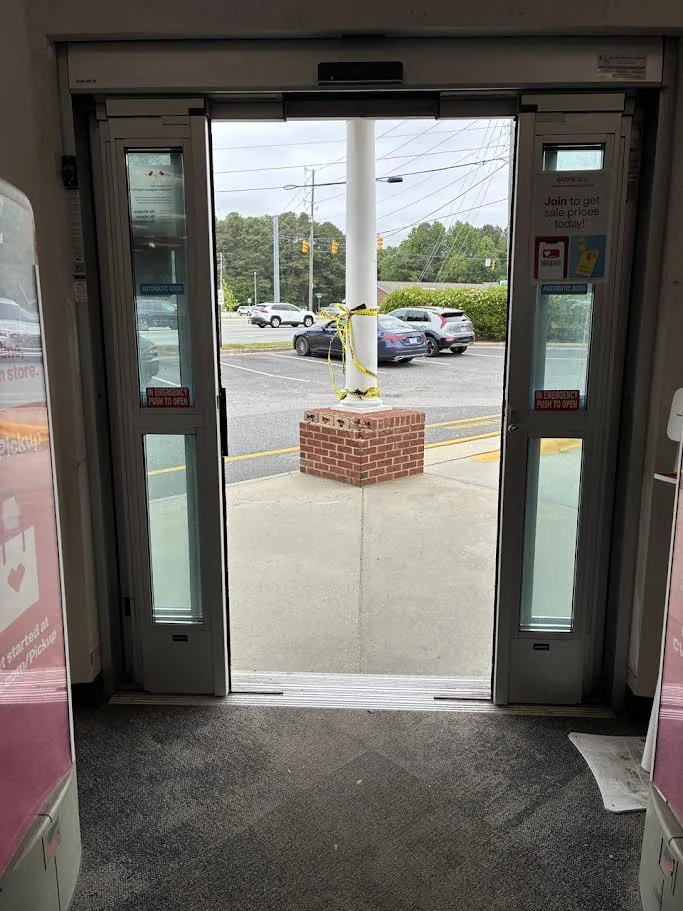 Automatic sliding doors temporarily taped off pending GHK service